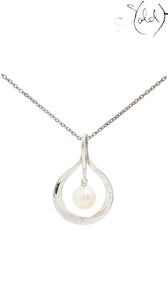 Sold Attire vintage Mikimoto sterling silver pendant necklace featuring a cream cultured pearl in a teardrop frame.