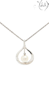 Sold Attire Mikimoto sterling silver pendant necklace featuring a single cream cultured pearl in a teardrop frame
