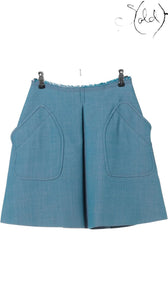 Sold Attire blue Miu Miu wool and polyester flared mini skirt with large front pockets and frayed waist detail.