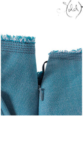 Sold Attire Miu Miu blue wool blend skirt featuring a frayed hem and a concealed side zipper closure.