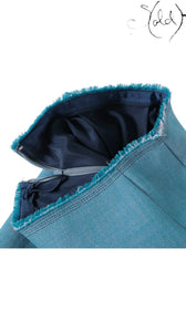 Sold Attire blue Miu Miu wool and polyester skirt featuring a frayed edge detail and internal lining.