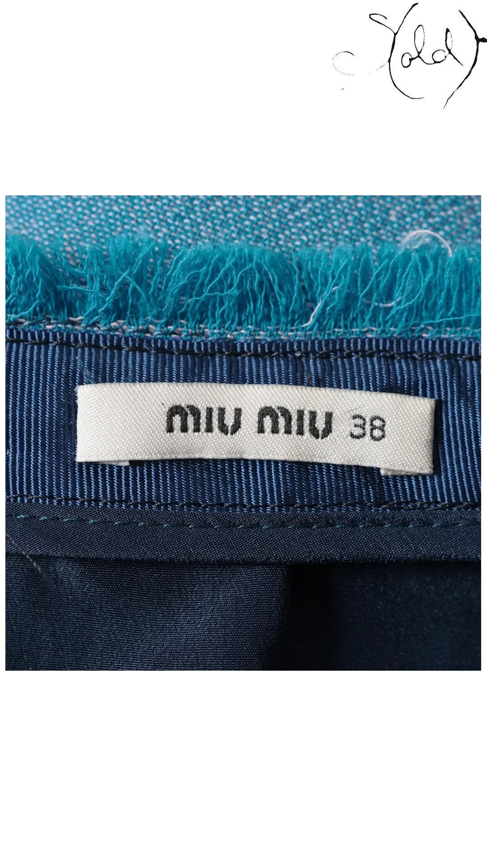 Sold Attire Miu Miu size 38 skirt label with blue wool fabric and frayed trim detail