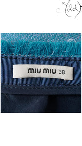 Sold Attire Miu Miu size 38 skirt label with blue wool fabric and frayed trim detail