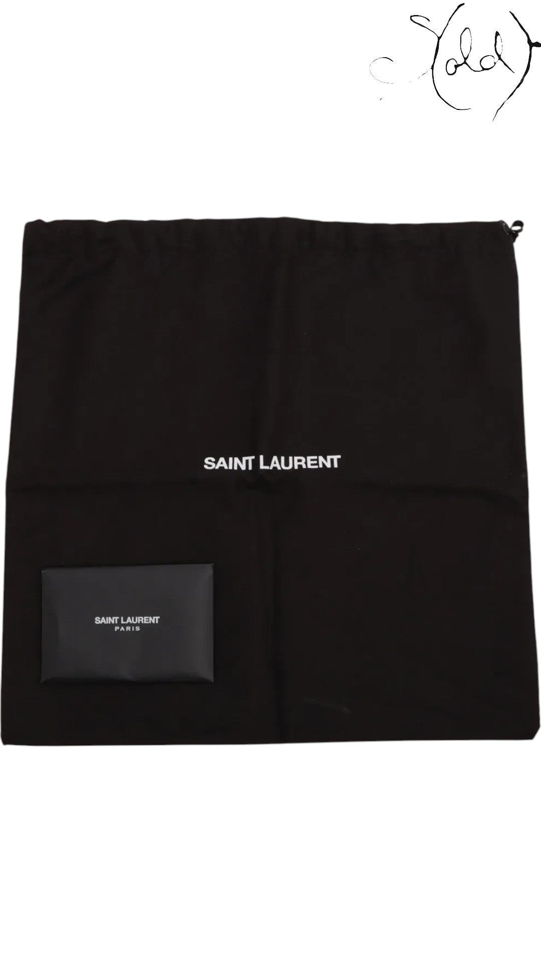 Sold Attire black fabric dust bag with Saint Laurent logo and small black pouch with Saint Laurent Paris logo.