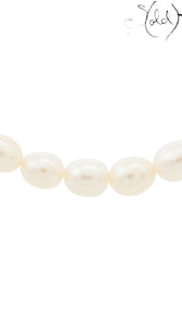 Sold Attire pre-owned TASAKI cream pearl necklace with a single strand design and silver clasp hardware